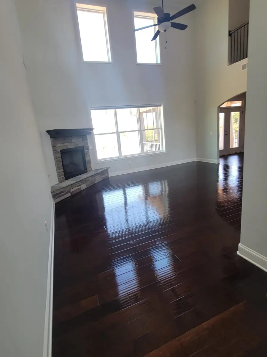 Freshly painted living room walls and white trim in a Greenville, SC home